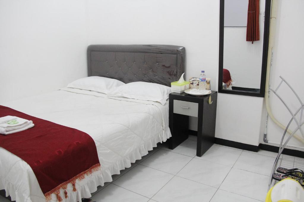Providence Homestay سورابايا الغرفة الصورة